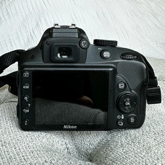 Nikon d3300 DSLR camera, lenses, speed light flash and case